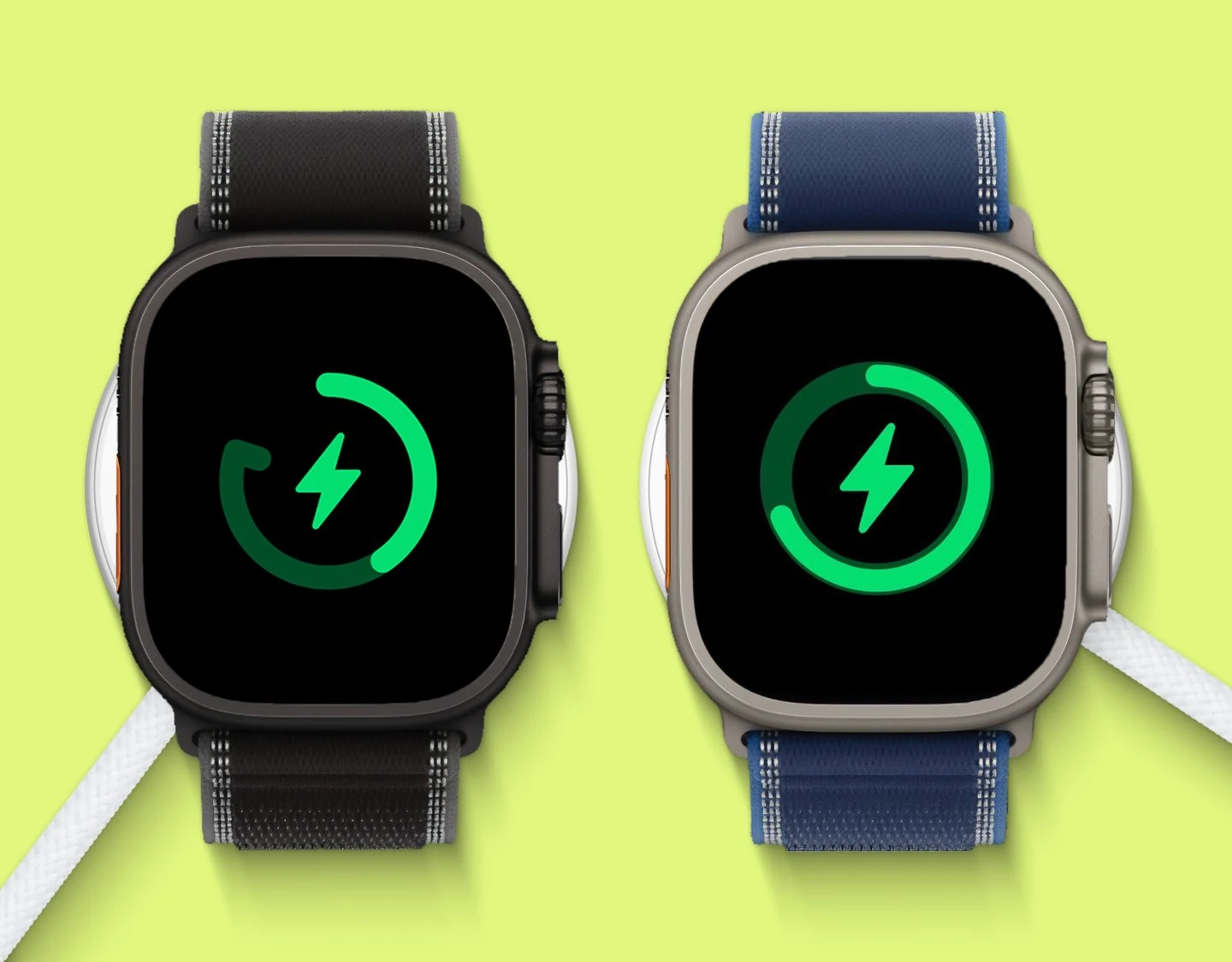 The Apple Watch Ultra 3 charging on its dock beside the Ultra 2, showing battery percentage differences.